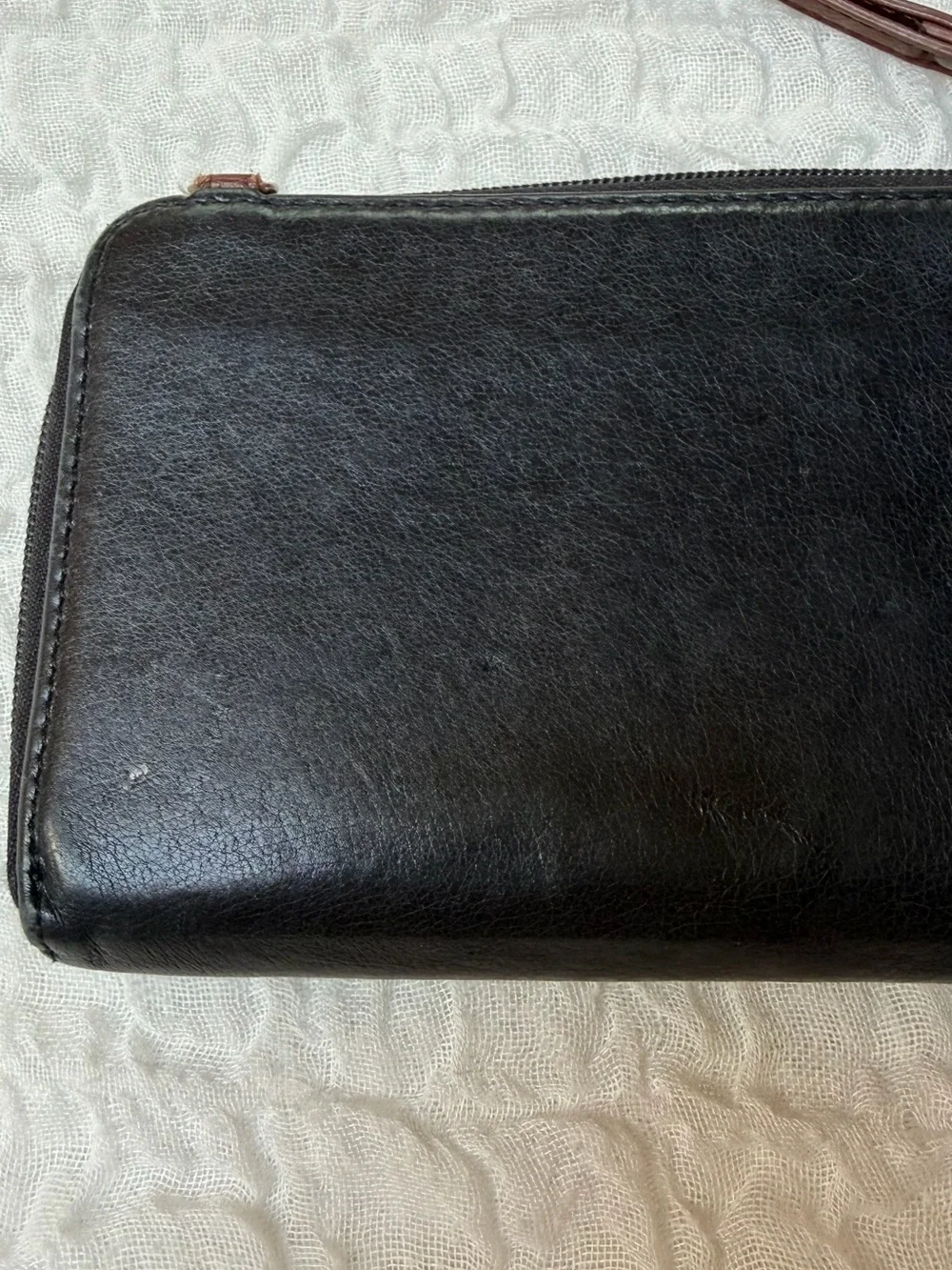 The Sak Smartphone Black and Brown Leather Wristlet